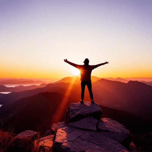 An image showcasing a solitary figure standing on a mountaintop, surrounded by a vibrant sunset