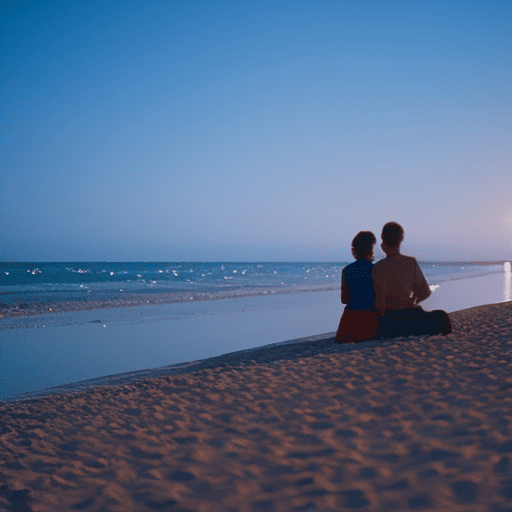 An image displaying a serene moonlit beach scene, with two individuals sitting side by side, engrossed in deep conversation, conveying the emotional depth and understanding that Cancer signs share effortlessly